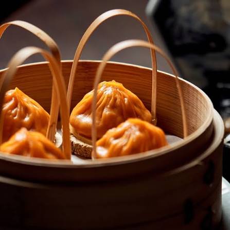 Mott 32 signature dishes Dim Sum Soup Dumpling
Smoked Apple Wood Pecking Duck
Wagyu Beef